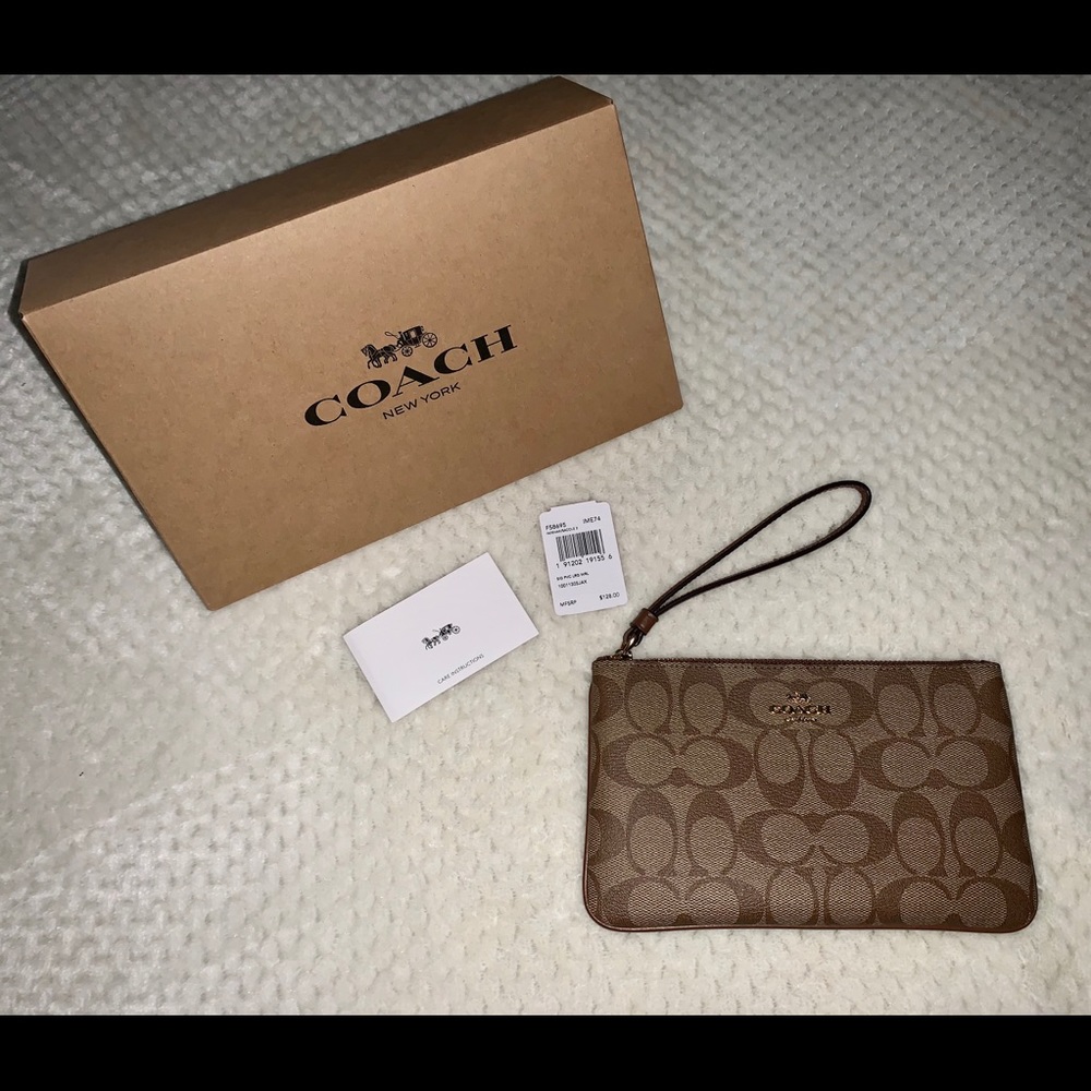100% Authentic Coach large wristlet (NWT)